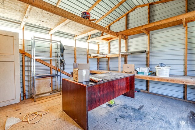 home office featuring vaulted ceiling