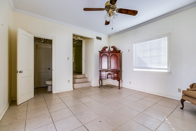 unfurnished bedroom with light tile patterned floors, ornamental molding, visible vents, and baseboards