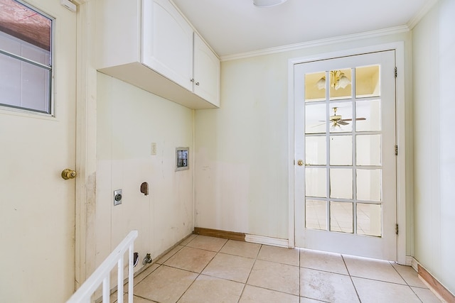 laundry room with light tile patterned floors, hookup for a washing machine, cabinet space, ornamental molding, and electric dryer hookup