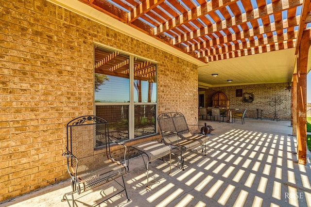 view of patio featuring a pergola