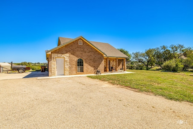 view of front of home with a front yard