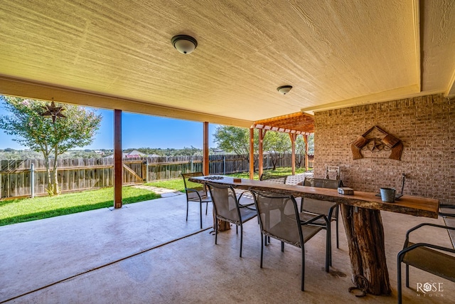 view of patio / terrace with an outdoor bar