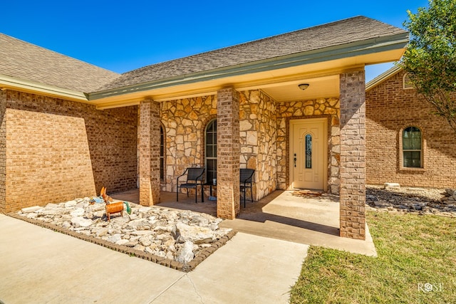 entrance to property with a patio area