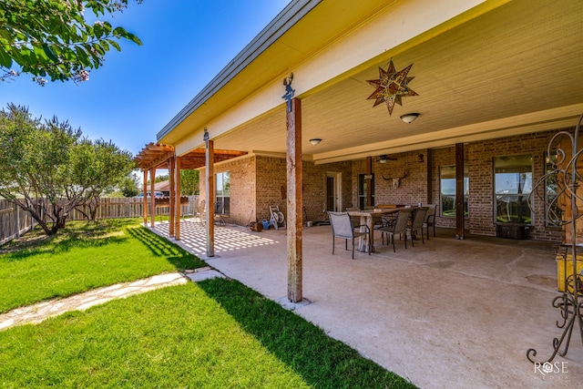 view of patio / terrace featuring ceiling fan