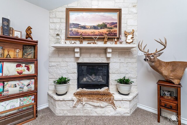 4137 Sedona Trl, San Angelo, TX 76904 - carpeted living room with baseboards and a fireplace