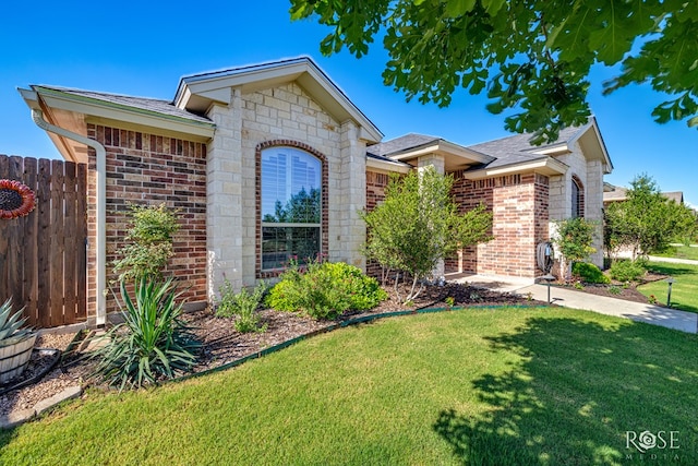 4137 Sedona Trl, San Angelo, TX 76904 - view of front of home featuring brick siding and a shingled roof