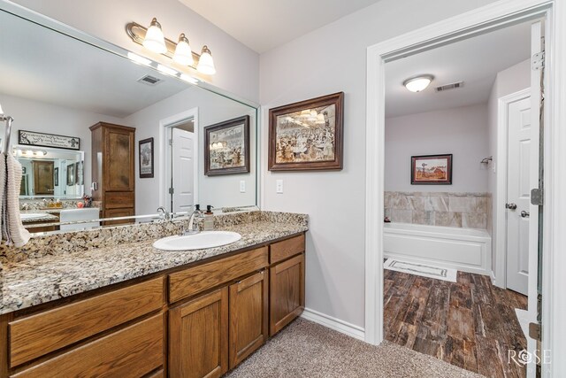 4137 Sedona Trl, San Angelo, TX 76904 - full bath featuring vanity and a garden tub
