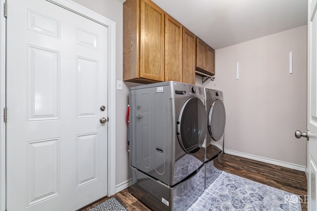 4137 Sedona Trl, San Angelo, TX 76904 - laundry area with cabinet space, washer and dryer, baseboards, and dark wood-type flooring