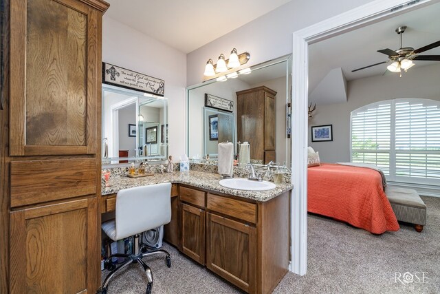 4137 Sedona Trl, San Angelo, TX 76904 - ensuite bathroom featuring ceiling fan and vanity