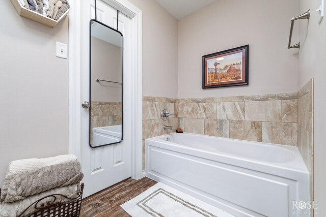 4137 Sedona Trl, San Angelo, TX 76904 - bathroom featuring wood finished floors and a garden tub
