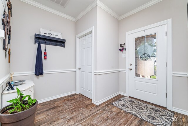 4137 Sedona Trl, San Angelo, TX 76904 - foyer featuring wood finished floors, ornamental molding, and baseboards