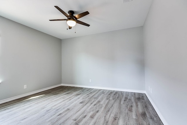 2822 Joshua St, San Angelo, TX 76905 - unfurnished room featuring wood finished floors, ceiling fan, and baseboards