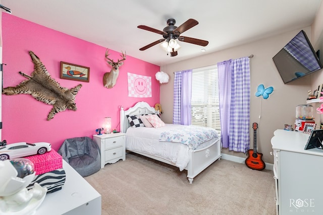 bedroom with light carpet and ceiling fan