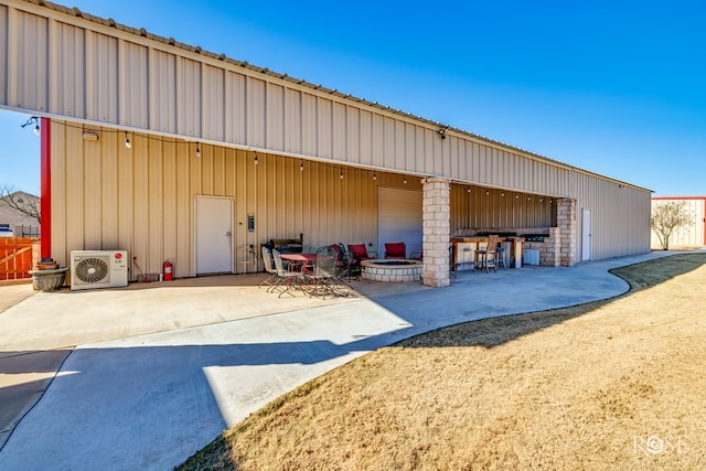 exterior space featuring ac unit