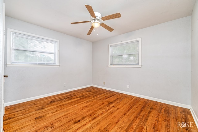 2501 Tcu Ave, San Angelo, TX 76904 - spare room featuring wood finished floors and a ceiling fan