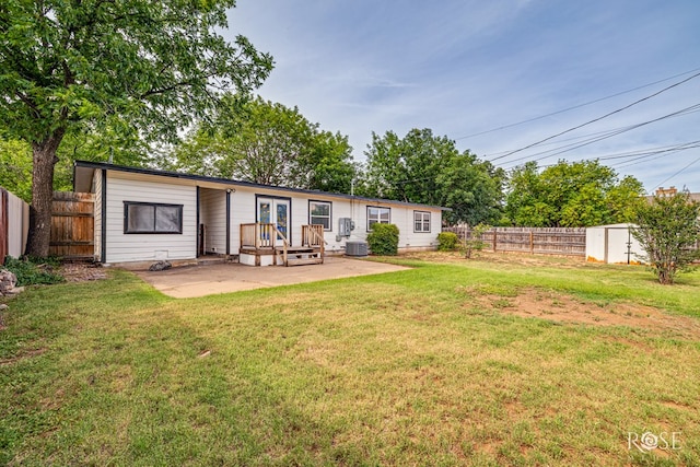 2501 Tcu Ave, San Angelo, TX 76904 - rear view of house with a patio area, a fenced backyard, and french doors