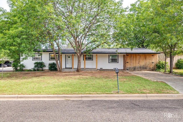 2501 Tcu Ave, San Angelo, TX 76904 - single story home featuring a front lawn and concrete driveway