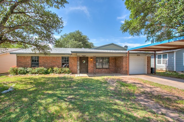 119 Van Zandt St, San Angelo, TX 76905 - ranch-style house with a garage, brick siding, a front yard, and concrete driveway