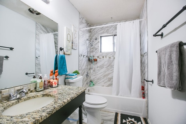 119 Van Zandt St, San Angelo, TX 76905 - full bathroom with shower / bath combo, toilet, and vanity