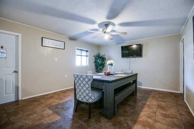 119 Van Zandt St, San Angelo, TX 76905 - home office with a ceiling fan, crown molding, a textured ceiling, baseboards, and tile patterned flooring