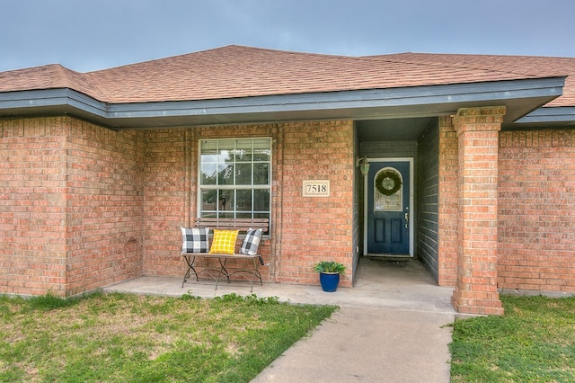 entrance to property with covered porch