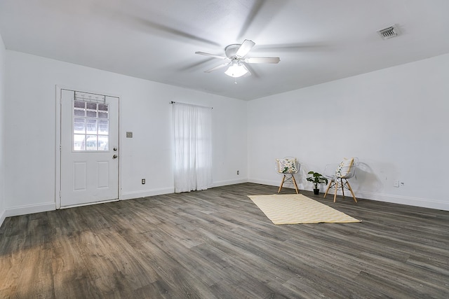 foyer featuring dark hardwood / wood-style floors and ceiling fan