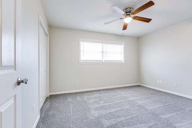 2729 Rio Grande St, San Angelo, TX 76904 - unfurnished bedroom featuring carpet, baseboards, a closet, and ceiling fan
