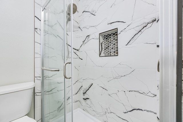 2729 Rio Grande St, San Angelo, TX 76904 - bathroom featuring a marble finish shower and toilet