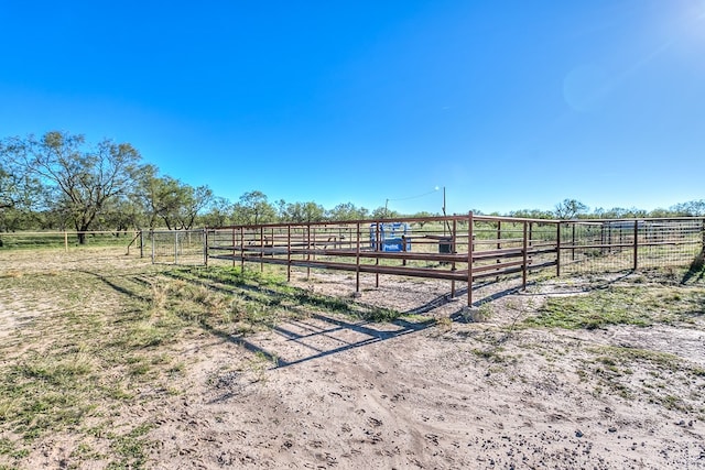 exterior space with a rural view