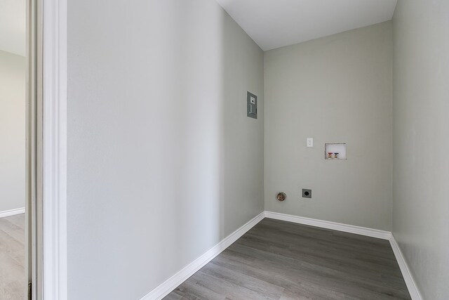 laundry area with light hardwood / wood-style floors, hookup for a washing machine, and electric dryer hookup