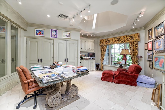 office space featuring crown molding and a raised ceiling