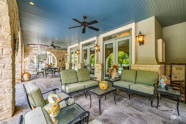 view of patio / terrace with french doors, ceiling fan, and an outdoor hangout area