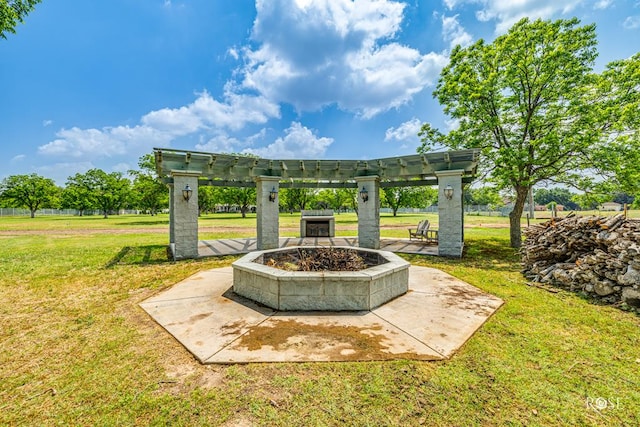 exterior space featuring an outdoor fire pit