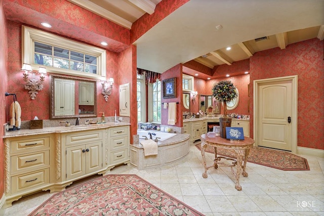 bathroom featuring beamed ceiling, vanity, a towering ceiling, and a tub to relax in