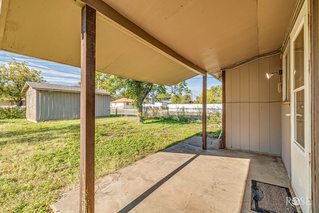 view of patio / terrace with a storage unit