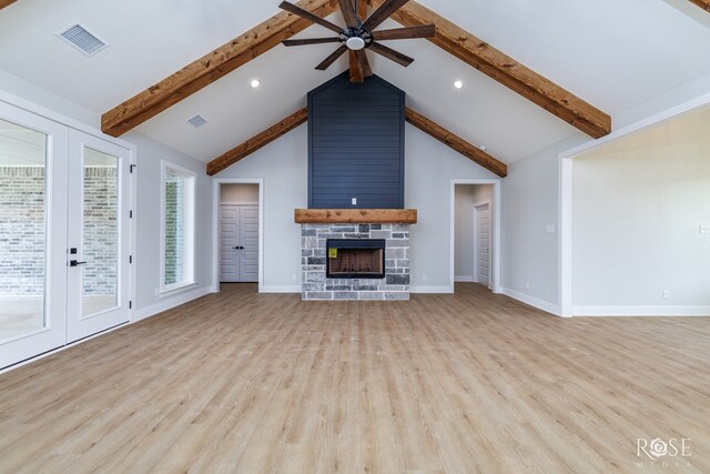 2734 Oak Hills Trl, San Angelo, TX 76904 - unfurnished living room with ceiling fan, french doors, wood finished floors, a fireplace, and recessed lighting