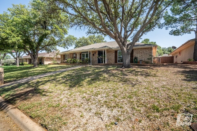 3709 Tridens Trl, San Angelo, TX 76904 - rear view of house with brick siding