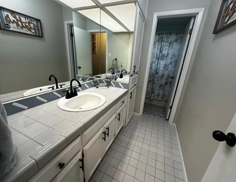 3709 Tridens Trl, San Angelo, TX 76904 - bathroom with vanity and tile patterned floors