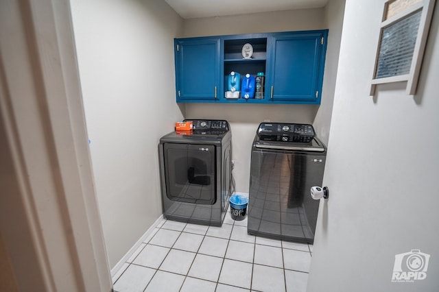 3709 Tridens Trl, San Angelo, TX 76904 - washroom with washing machine and dryer, cabinet space, and light tile patterned floors
