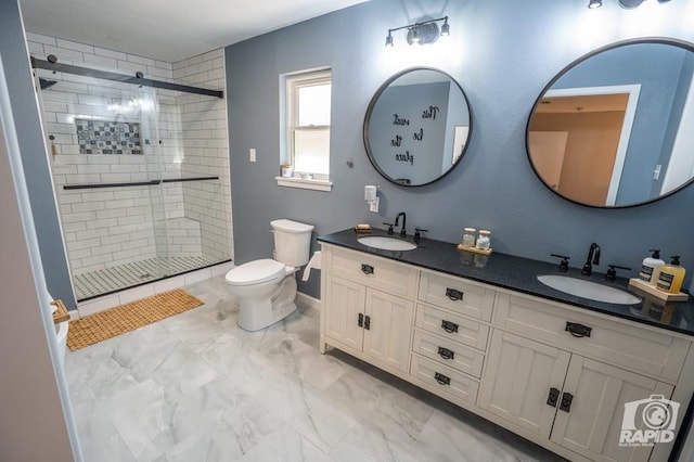 3709 Tridens Trl, San Angelo, TX 76904 - bathroom with double vanity, tiled shower, and marble finish flooring