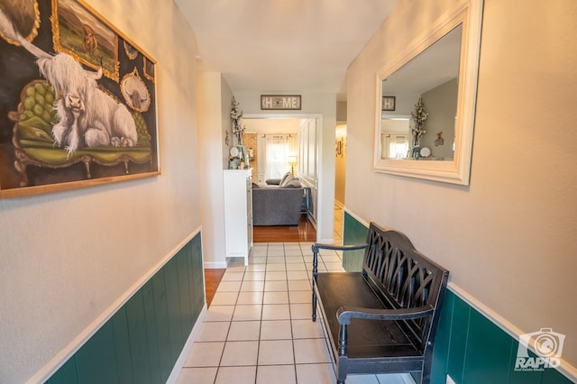 3709 Tridens Trl, San Angelo, TX 76904 - hallway featuring a wainscoted wall and tile patterned floors