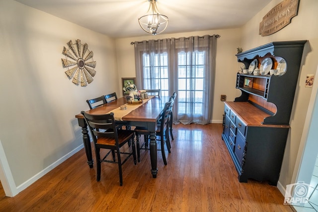 3709 Tridens Trl, San Angelo, TX 76904 - dining room featuring a chandelier and wood finished floors