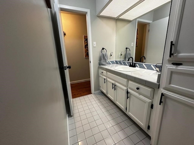 3709 Tridens Trl, San Angelo, TX 76904 - bathroom with tile patterned flooring and vanity