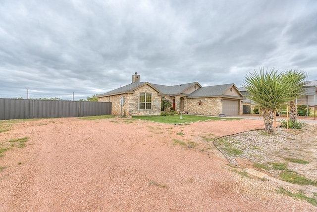 single story home featuring a garage