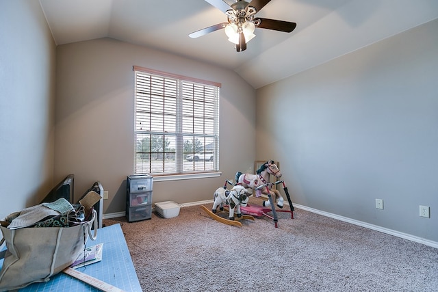 playroom with lofted ceiling, carpet flooring, and ceiling fan