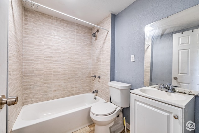 full bathroom with a textured wall, shower / bathtub combination, vanity, and toilet