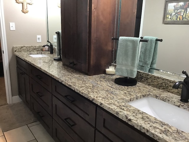 bathroom featuring vanity and tile patterned flooring