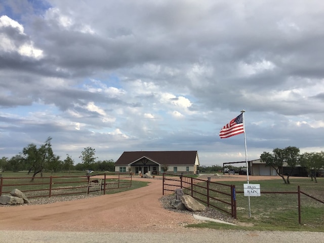 exterior space with a rural view