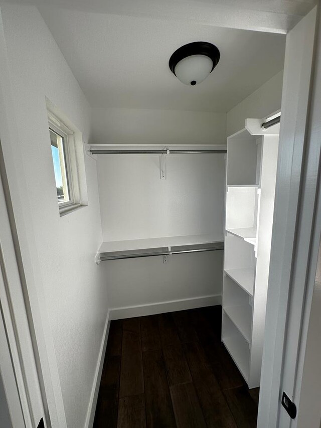 5610 Slayde St, San Angelo, TX 76904 - walk in closet featuring dark wood-style flooring