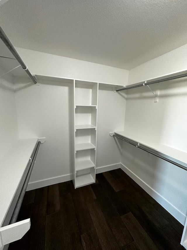 5610 Slayde St, San Angelo, TX 76904 - spacious closet featuring dark wood-type flooring